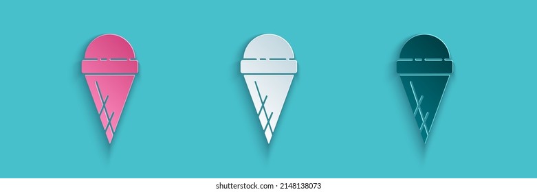 Paper cut Ice cream in waffle cone icon isolated on blue background. Sweet symbol. Paper art style. Vector Illustration