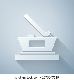 Paper cut Ice hockey cup champion icon isolated on grey background. Hockey trophy. Paper art style. Vector Illustration