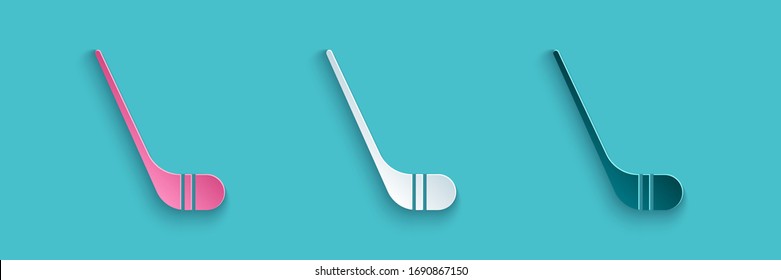 Paper cut Ice hockey sticks icon isolated on blue background. Paper art style. Vector Illustration
