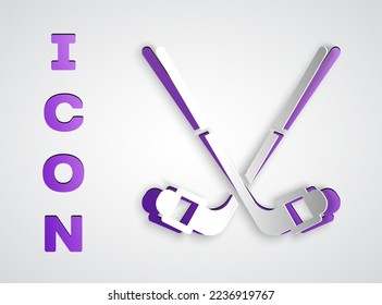 Paper cut Ice hockey sticks icon isolated on grey background. Paper art style. Vector