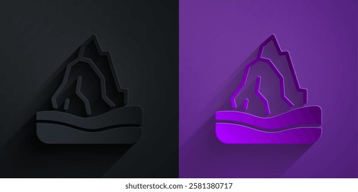 Paper cut Iceberg icon isolated on black on purple background. Paper art style. Vector