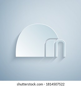 Paper cut Igloo ice house icon isolated on grey background. Snow home, Eskimo dome-shaped hut winter shelter, made of blocks. Paper art style. Vector.