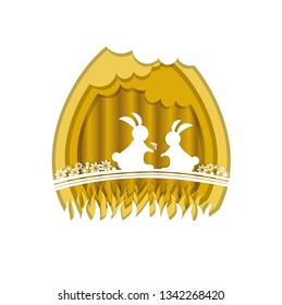 Paper cut illustration of Golden Easter egg with two rabbit,grass&cloud in side