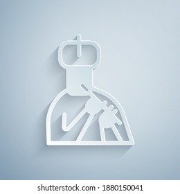 Paper cut Indian man plays flute icon isolated on grey background. Artist playing Bansuri folk music of India. Paper art style. Vector.