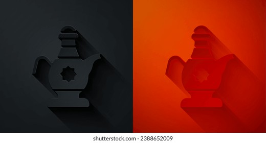 Paper cut Islamic teapot icon isolated on black and red background. Paper art style. Vector