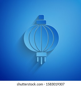 Paper cut Japanese paper lantern icon isolated on blue background. Paper art style. Vector Illustration