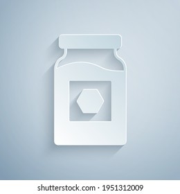 Paper cut Jar of honey icon isolated on grey background. Food bank. Sweet natural food symbol. Paper art style. Vector