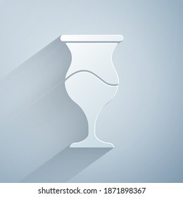 Paper cut Jewish goblet icon isolated on grey background. Jewish wine cup for kiddush. Kiddush cup for Shabbat. Paper art style. Vector
