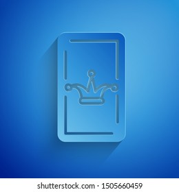 Paper cut Joker playing card icon isolated on blue background. Casino gambling. Paper art style. Vector Illustration