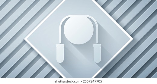 Paper cut Jump rope icon isolated on grey background. Skipping rope. Sport equipment. Paper art style. Vector