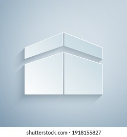 Paper cut Kaaba mosque icon isolated on grey background. Kaaba hajj Mecca pray pilgrimage Ramadan Islam muslim mosque. Paper art style. Vector.