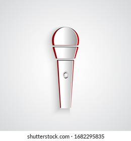 Paper cut Karaoke icon isolated on grey background. Microphone and monitor. Paper art style. Vector Illustration