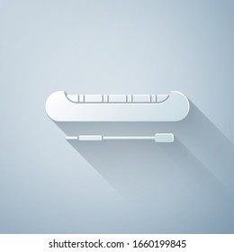 Paper cut Kayak and paddle icon isolated on grey background. Kayak and canoe for fishing and tourism. Outdoor activities. Paper art style. Vector Illustration