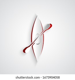 Paper cut Kayak and paddle icon isolated on grey background. Kayak and canoe for fishing and tourism. Outdoor activities. Paper art style. Vector Illustration