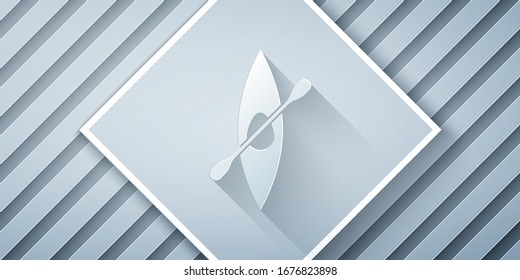 Paper cut Kayak and paddle icon isolated on grey background. Kayak and canoe for fishing and tourism. Outdoor activities. Paper art style. Vector Illustration