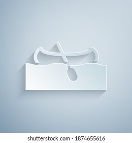 Paper cut Kayak and paddle icon isolated on grey background. Kayak and canoe for fishing and tourism. Outdoor activities. Paper art style. Vector.