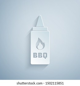 Paper cut Ketchup bottle icon isolated on grey background. Fire flame icon. Barbecue and BBQ grill symbol. Paper art style. Vector Illustration