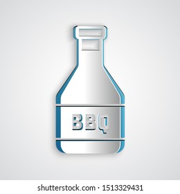 Paper cut Ketchup bottle icon isolated on grey background. Barbecue and BBQ grill symbol. Paper art style. Vector Illustration