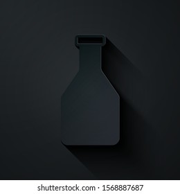Paper cut Ketchup bottle icon isolated on black background. Paper art style. Vector Illustration