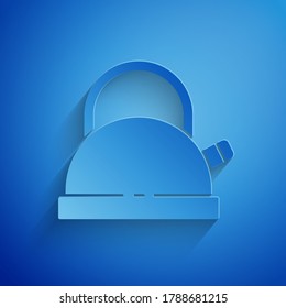 Paper cut Kettle with handle icon isolated on blue background. Teapot icon. Paper art style. Vector