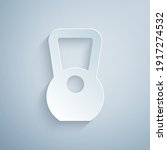 Paper cut Kettlebell icon isolated on grey background. Sport equipment. Paper art style. Vector.