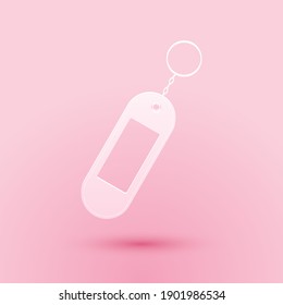 Paper cut Key chain icon isolated on pink background. Blank rectangular keychain with ring and chain for key. Paper art style. Vector.