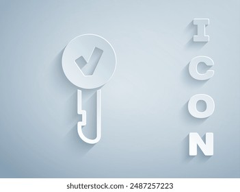 Paper cut Key icon isolated on grey background. Paper art style. Vector Illustration