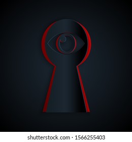 Paper cut Keyhole with eye icon isolated on black background. The eye looks into the keyhole. Keyhole eye hole. Paper art style. Vector Illustration