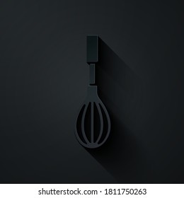Paper cut Kitchen whisk icon isolated on black background. Cooking utensil, egg beater. Cutlery sign. Food mix symbol. Paper art style. Vector.
