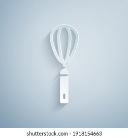 Paper cut Kitchen whisk icon isolated on grey background. Cooking utensil, egg beater. Cutlery sign. Food mix symbol. Paper art style. Vector.