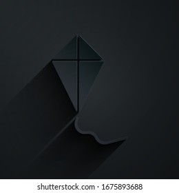 Paper cut Kite icon isolated on black background. Paper art style. Vector Illustration