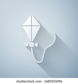 Paper cut Kite icon isolated on grey background. Paper art style. Vector Illustration