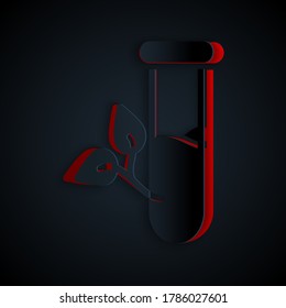 Paper cut Laboratory glass and leaves icon isolated on black background. Chemical test tube with leaf. Eco Lab. Paper art style. Vector