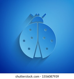 Paper cut Ladybug icon isolated on blue background. Paper art style. Vector Illustration