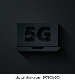 Paper cut Laptop with 5G new wireless internet wifi icon isolated on black background. Global network high speed connection data rate technology. Paper art style. Vector