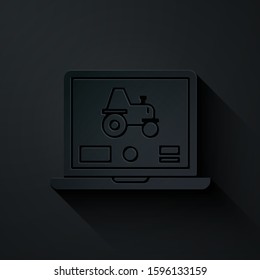 Paper cut Laptop application for control a autonomous tractor on a smart farm icon isolated on black background. Smart agriculture implement. Paper art style. Vector Illustration