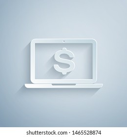 Paper cut Laptop with dollar symbol icon isolated on grey background. Online shopping concept. Economy concept. Paper art style. Vector Illustration