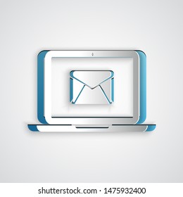Paper cut Laptop with envelope and open email on screen icon isolated on grey background. Email marketing, internet advertising concepts. Paper art style. Vector Illustration