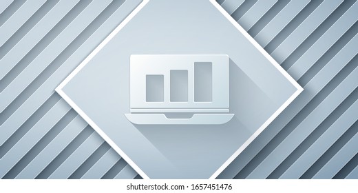 Paper cut Laptop with graph chart icon isolated on grey background. Report text file icon. Accounting sign. Audit, analysis, planning. Paper art style. Vector Illustration