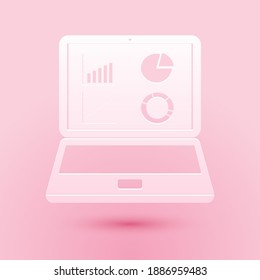 Paper cut Laptop with graph chart icon isolated on pink background. Report text file icon. Accounting sign. Audit, analysis, planning. Paper art style. Vector.