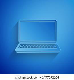 Paper cut Laptop icon isolated on blue background. Computer notebook with empty screen sign. Paper art style. Vector Illustration