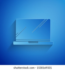 Paper cut Laptop icon isolated on blue background. Computer notebook with empty screen sign. Paper art style. Vector Illustration