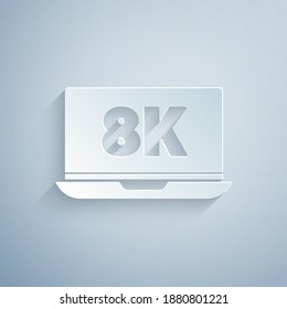 Paper cut Laptop screen with 8k video technology icon isolated on grey background. Paper art style. Vector.