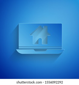 Paper cut Laptop and smart home icon isolated on blue background. Remote control. Paper art style. Vector Illustration