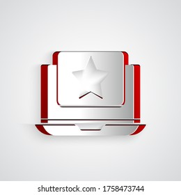 Paper cut Laptop with star icon isolated on grey background. Favorite, best rating, award symbol. Paper art style. Vector Illustration
