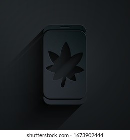 Paper cut Leaf on mobile phone screen icon isolated on black background. Paper art style. Vector Illustration