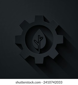 Paper cut Leaf plant ecology in gear machine icon isolated on black background. Eco friendly technology. World Environment day label. Paper art style. Vector