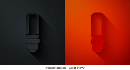 Paper cut LED light bulb icon isolated on black and red background. Economical LED illuminated lightbulb. Save energy lamp. Paper art style. Vector