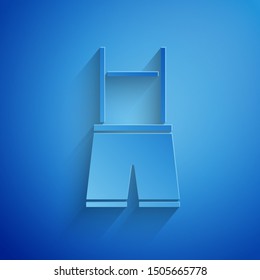Paper cut Lederhosen icon isolated on blue background. Traditional bavarian clothing. Oktoberfest outfit. Pants with suspenders. Patrick day. Paper art style. Vector Illustration