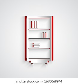 Icono de la estantería de biblioteca de corte de papel aislado en fondo gris. Estilo de arte de papel. Ilustración vectorial